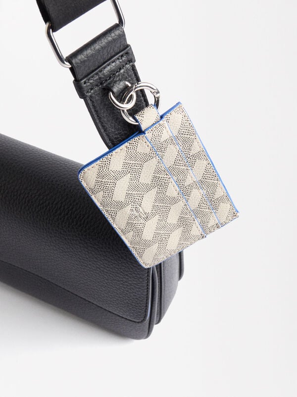 Crossbag with flap closure