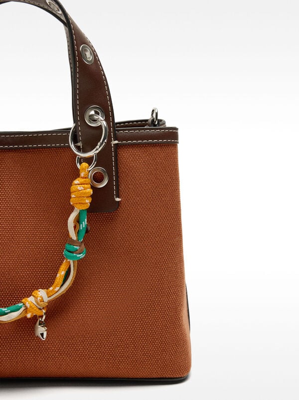 Fabric tote bag with pendant