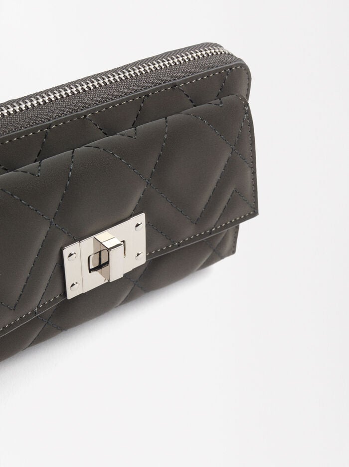 Cartera acolchada con cierre de solapa