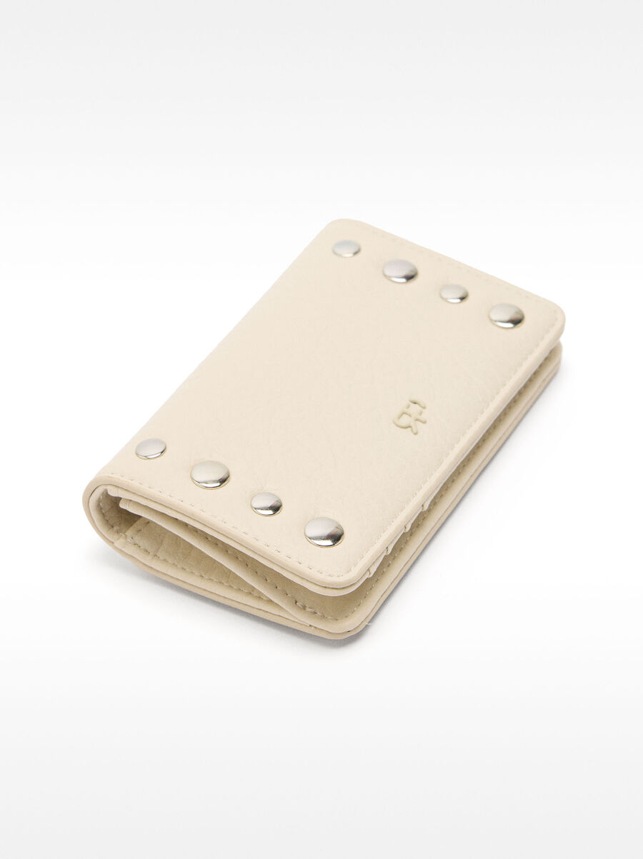 Card holder with studs
