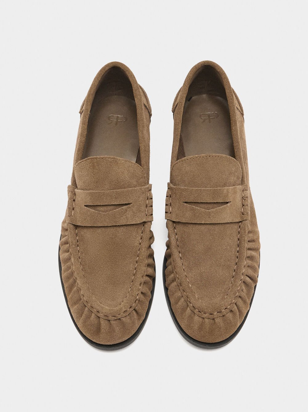 Leather moccasins with stitching