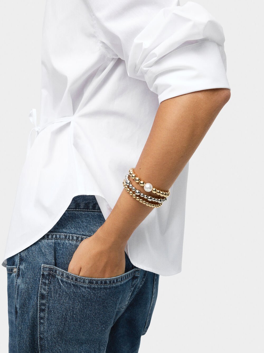 Set of three bicolor elastic bracelets