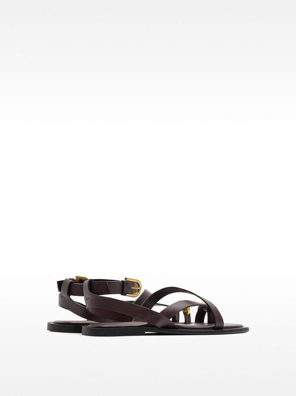 Leather sandals with metallic detail straps