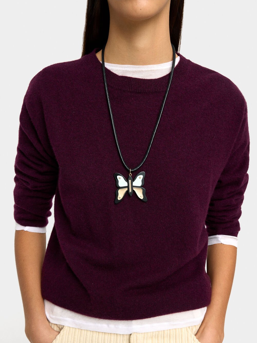 Cord necklace with butterfly pendant
