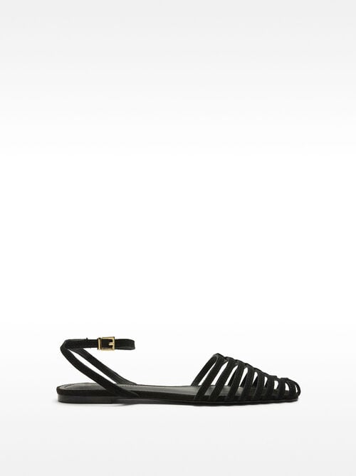 Flat leather sandals with straps