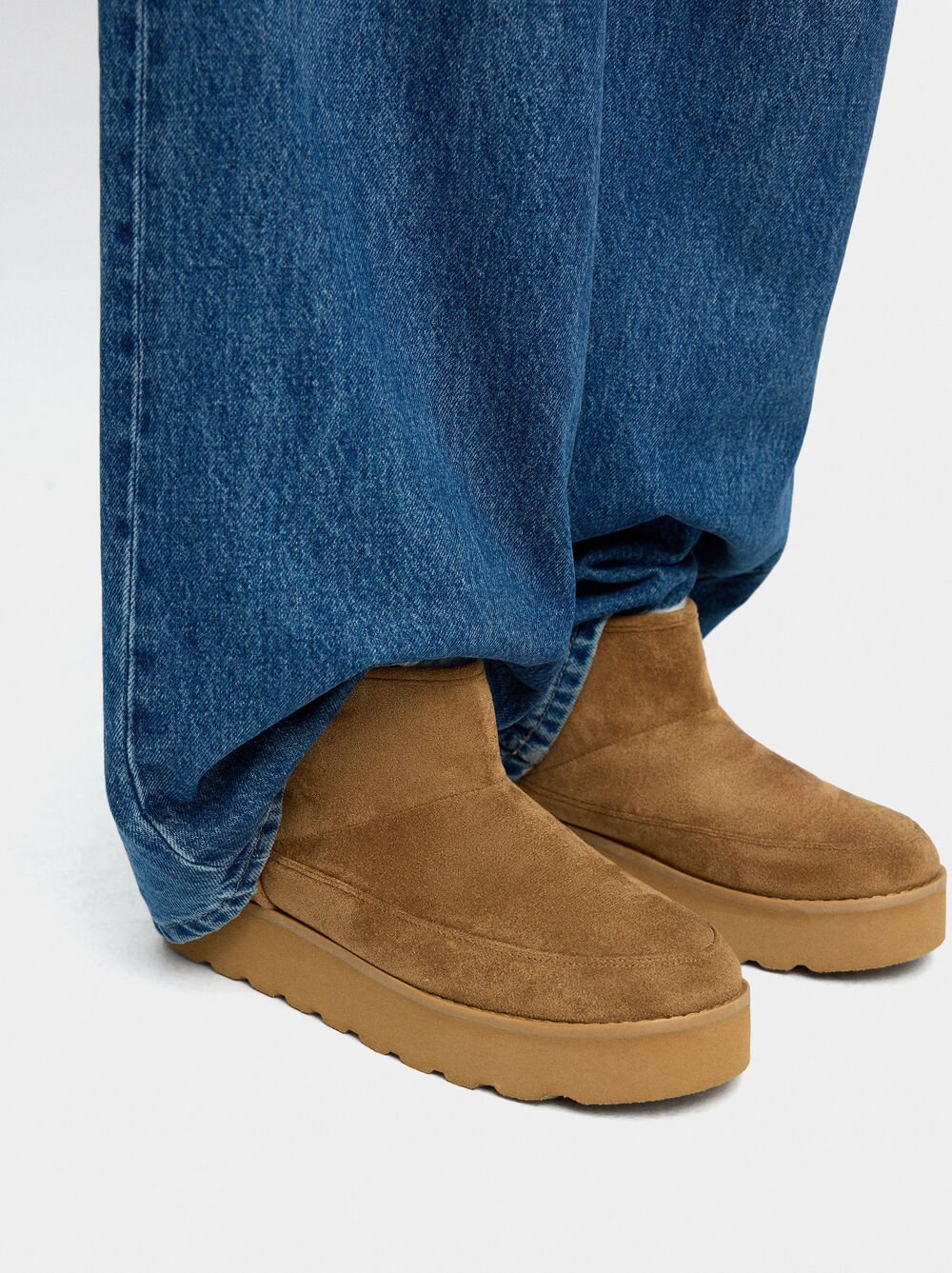 Leather-effect ankle boots with lining