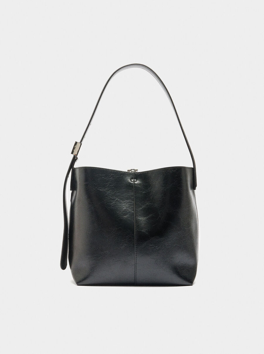 Bucket bag with cracked effect