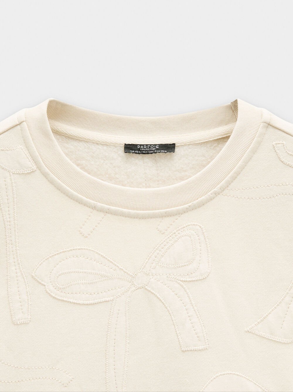 Sweatshirt with embroidered bows