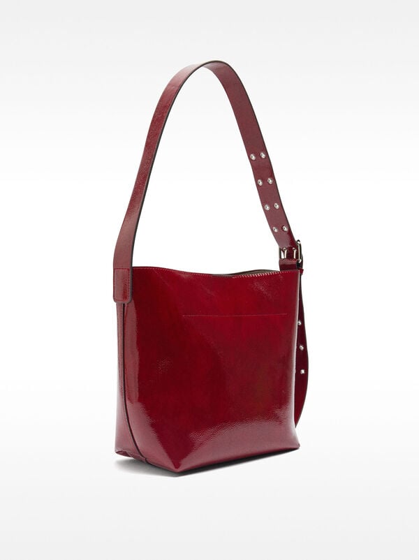 Shoulder bag with patent finish