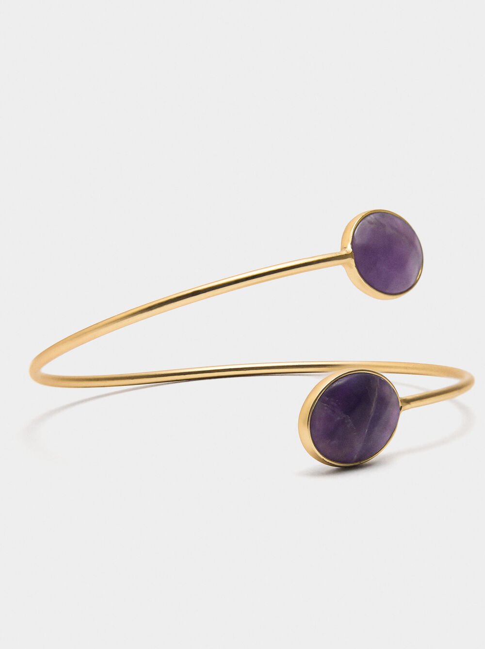 Rigid bracelet with stones