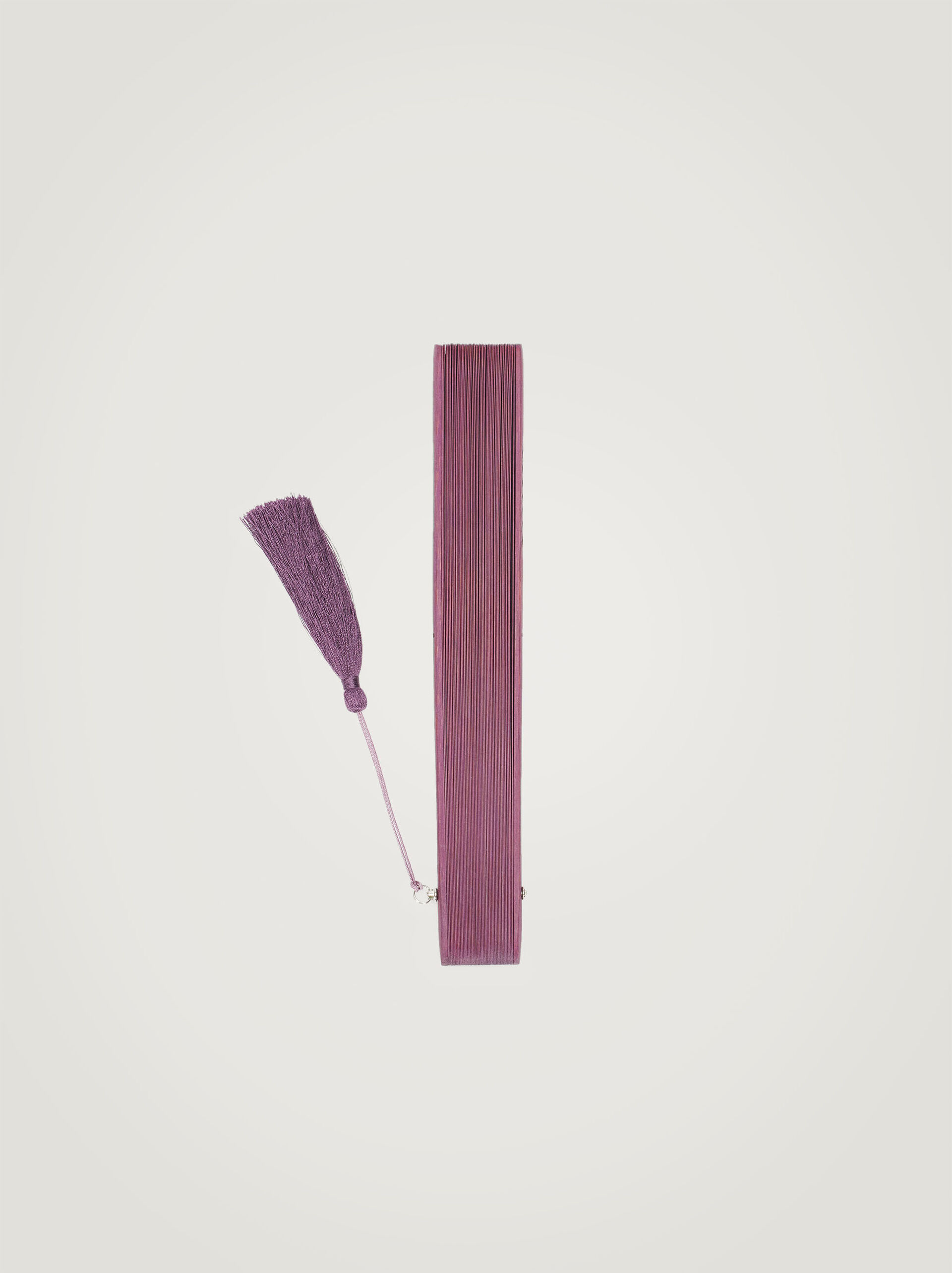 Perforated fan with tassel image number 2.0