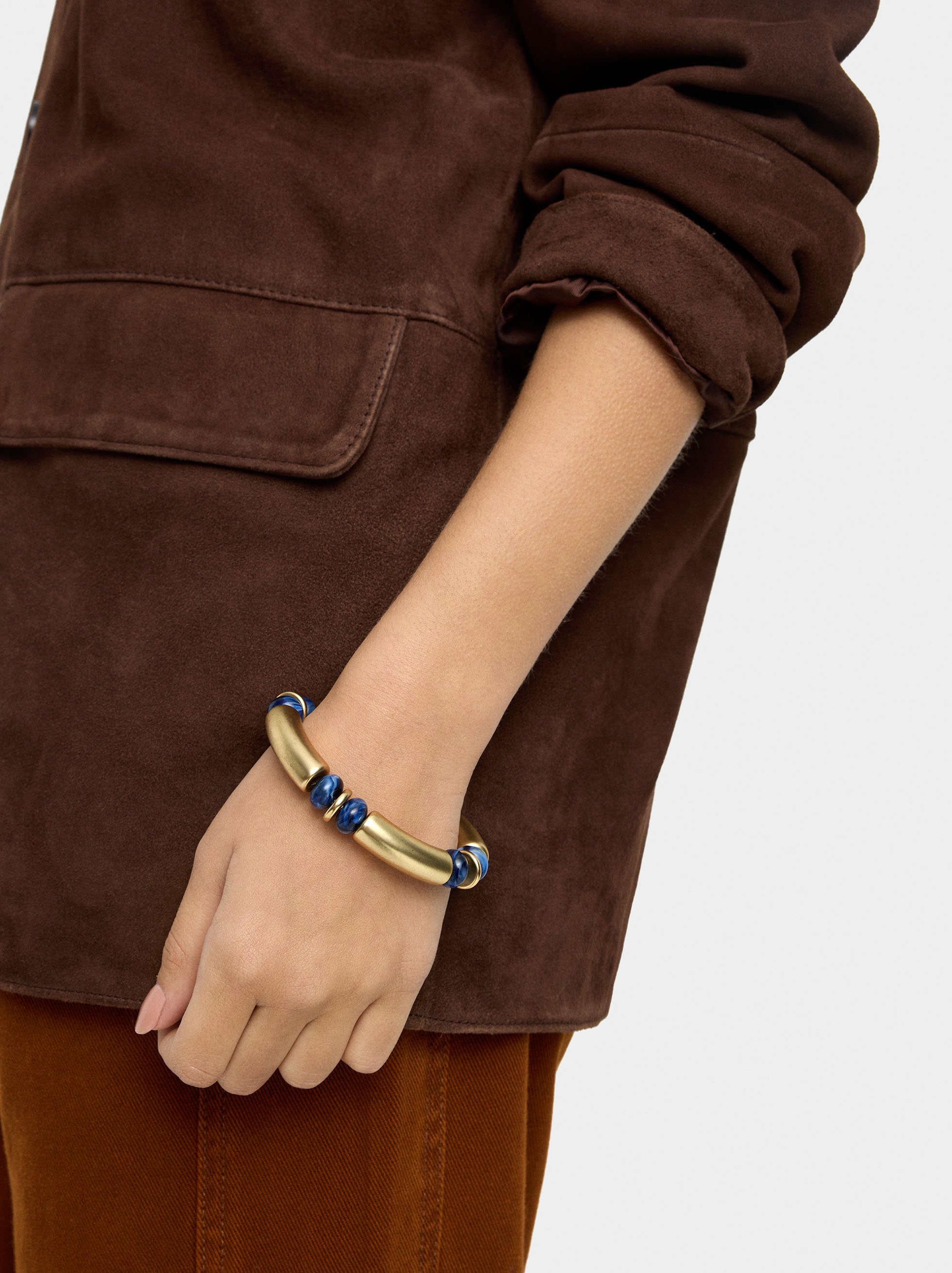 Bracelet segment&eacute; en perles effet pierre image number 1.0