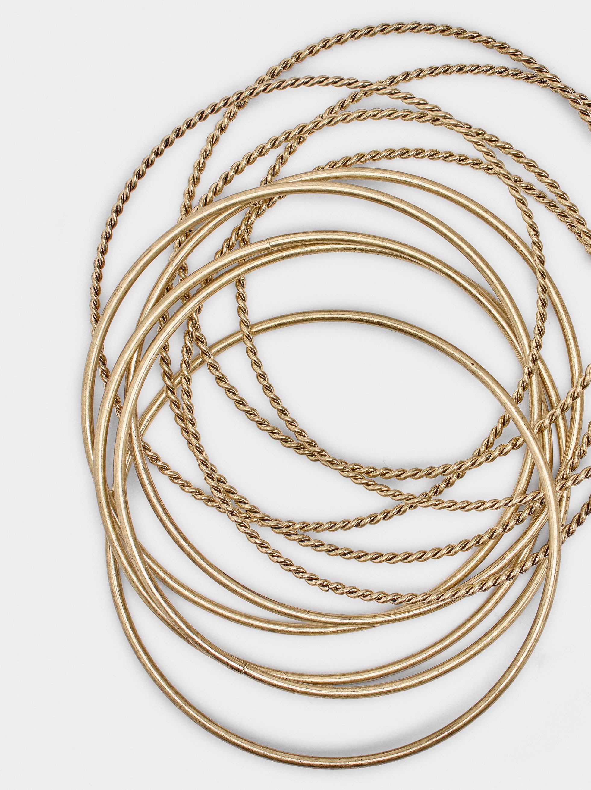 Set di braccialetti lisci e intrecciati image number 1.0