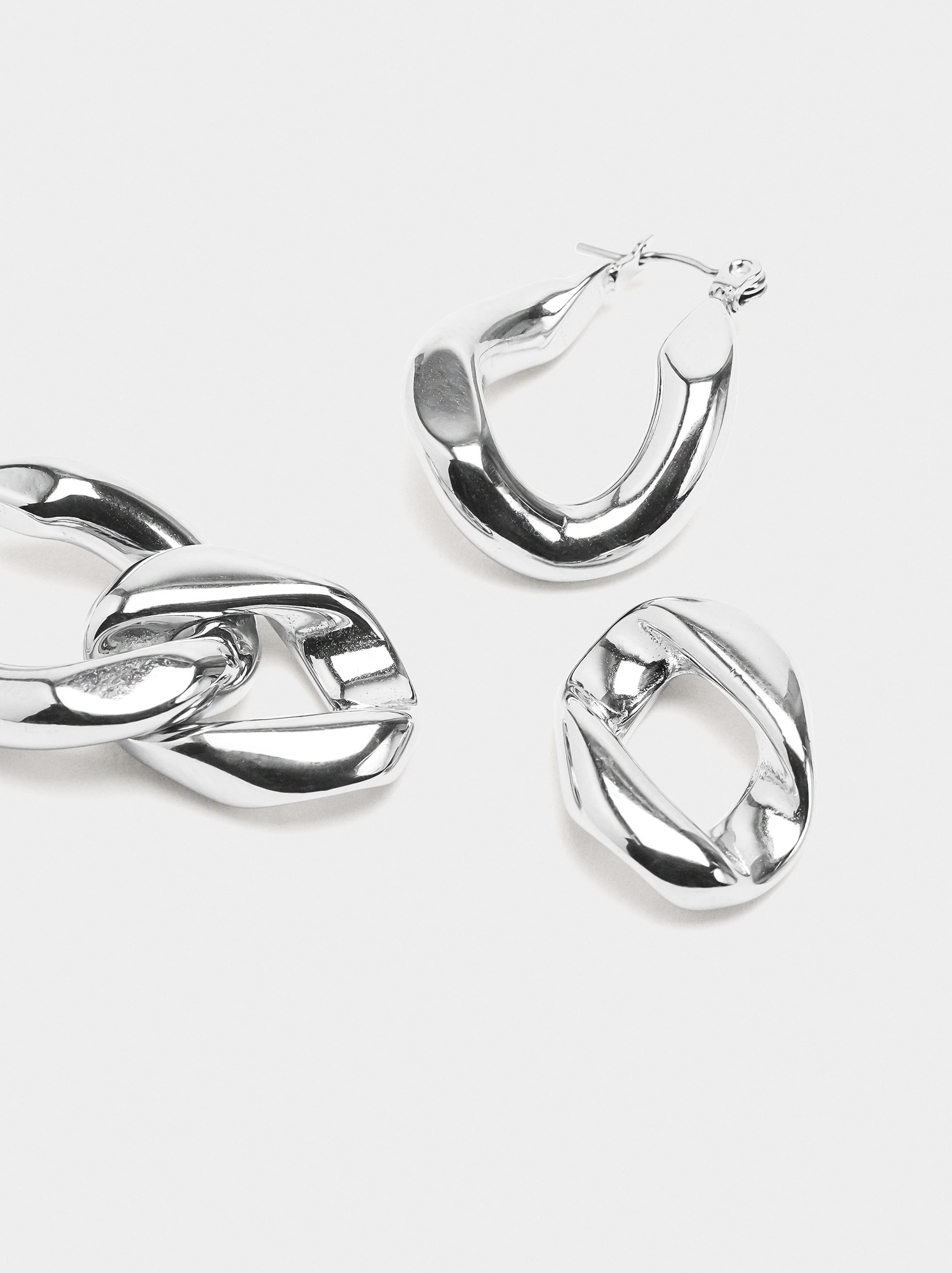 Irregular intertwined hoop earrings – stainless steel image number 1.0