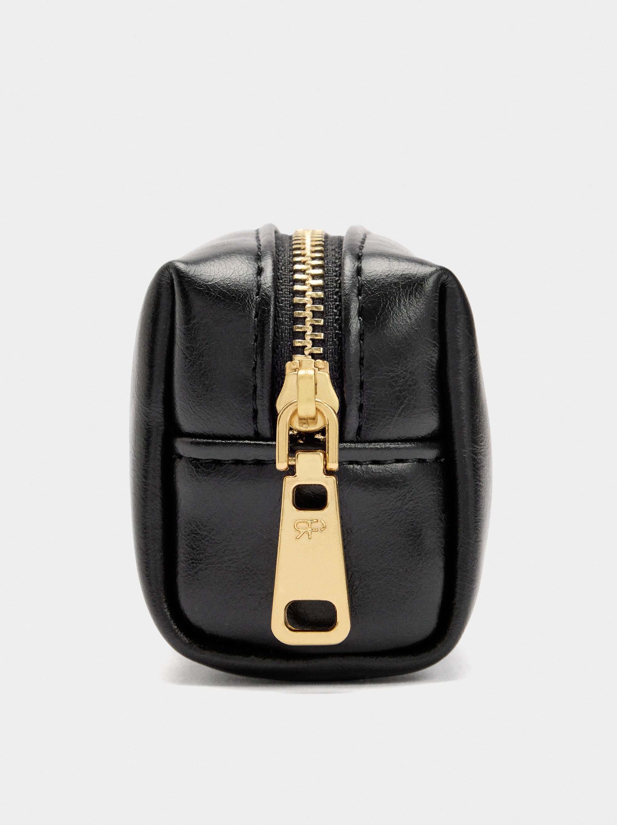 Coin purse with varnished effect image number 1.0