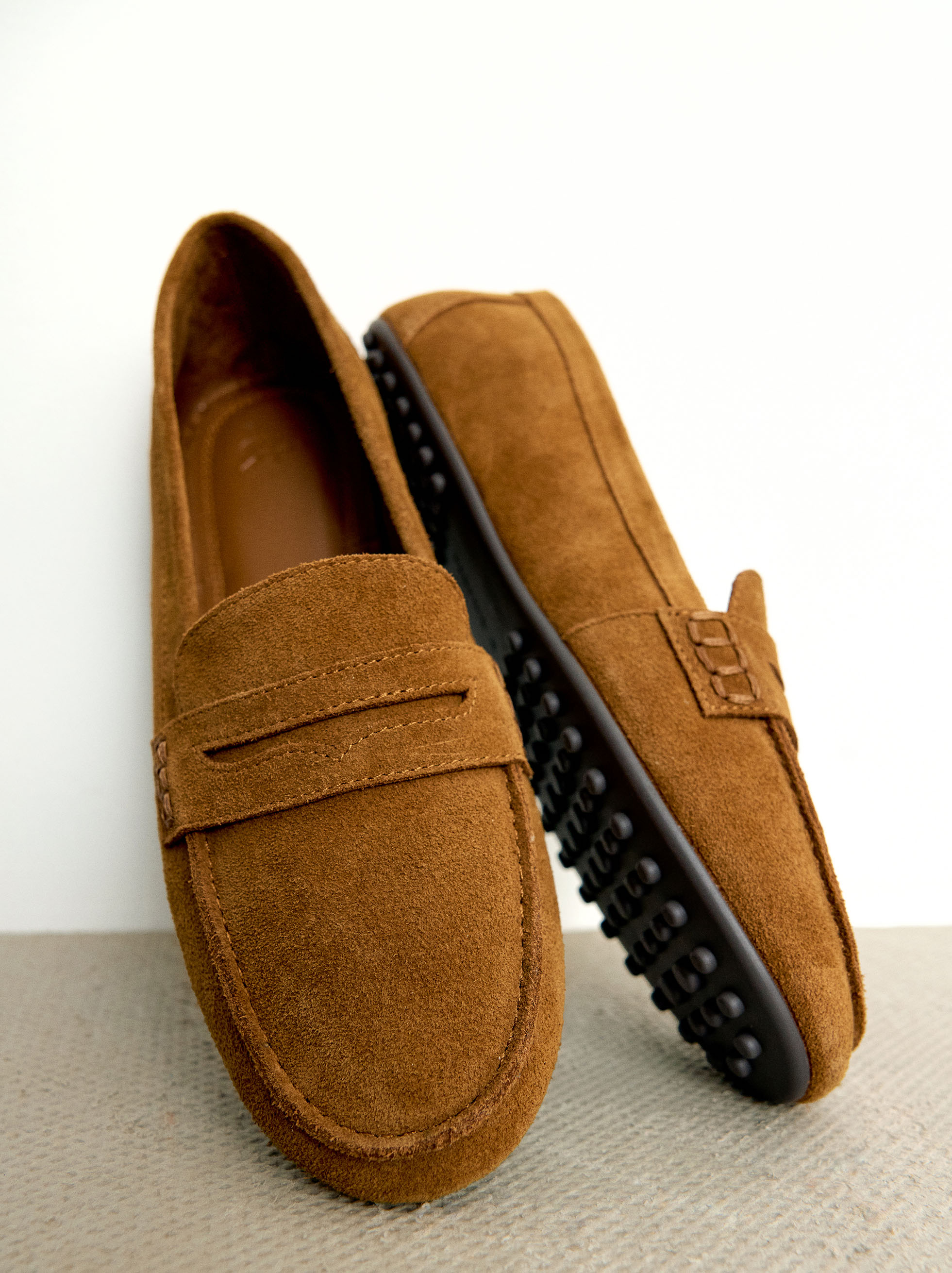 Leather moccasins with stitching