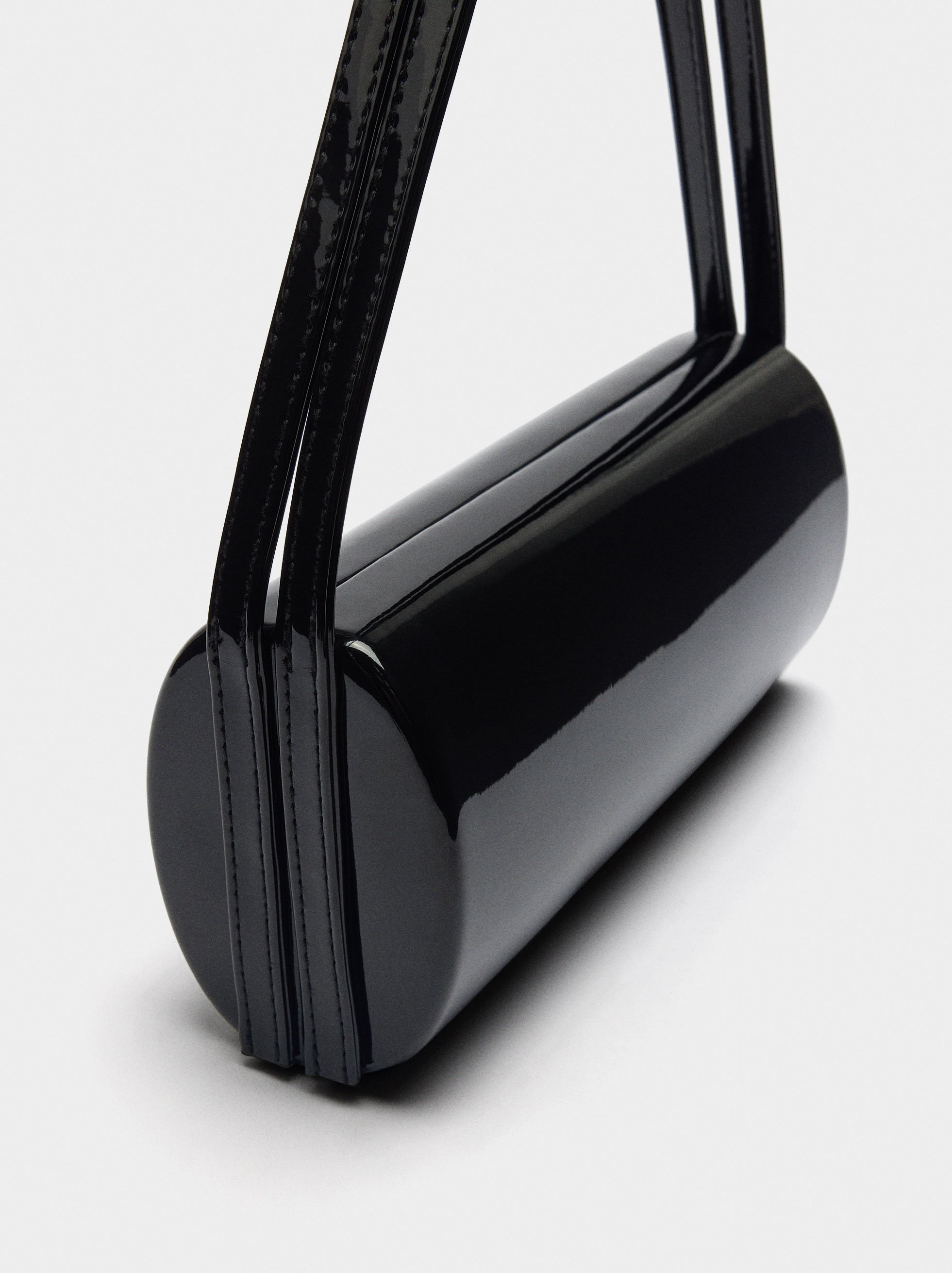 Cylindrical patent party clutch image number 1.0