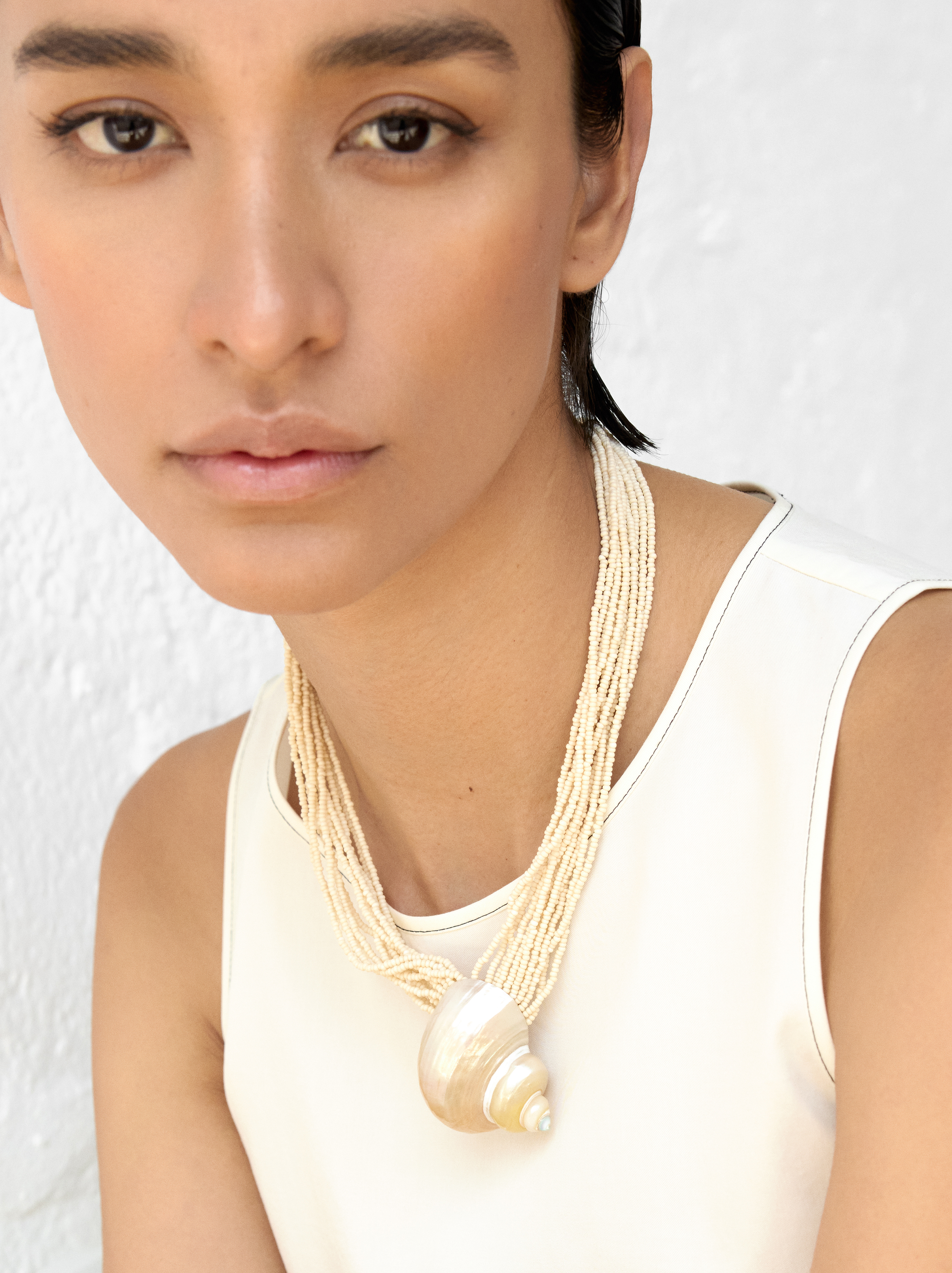 Multi-strand necklace with shell