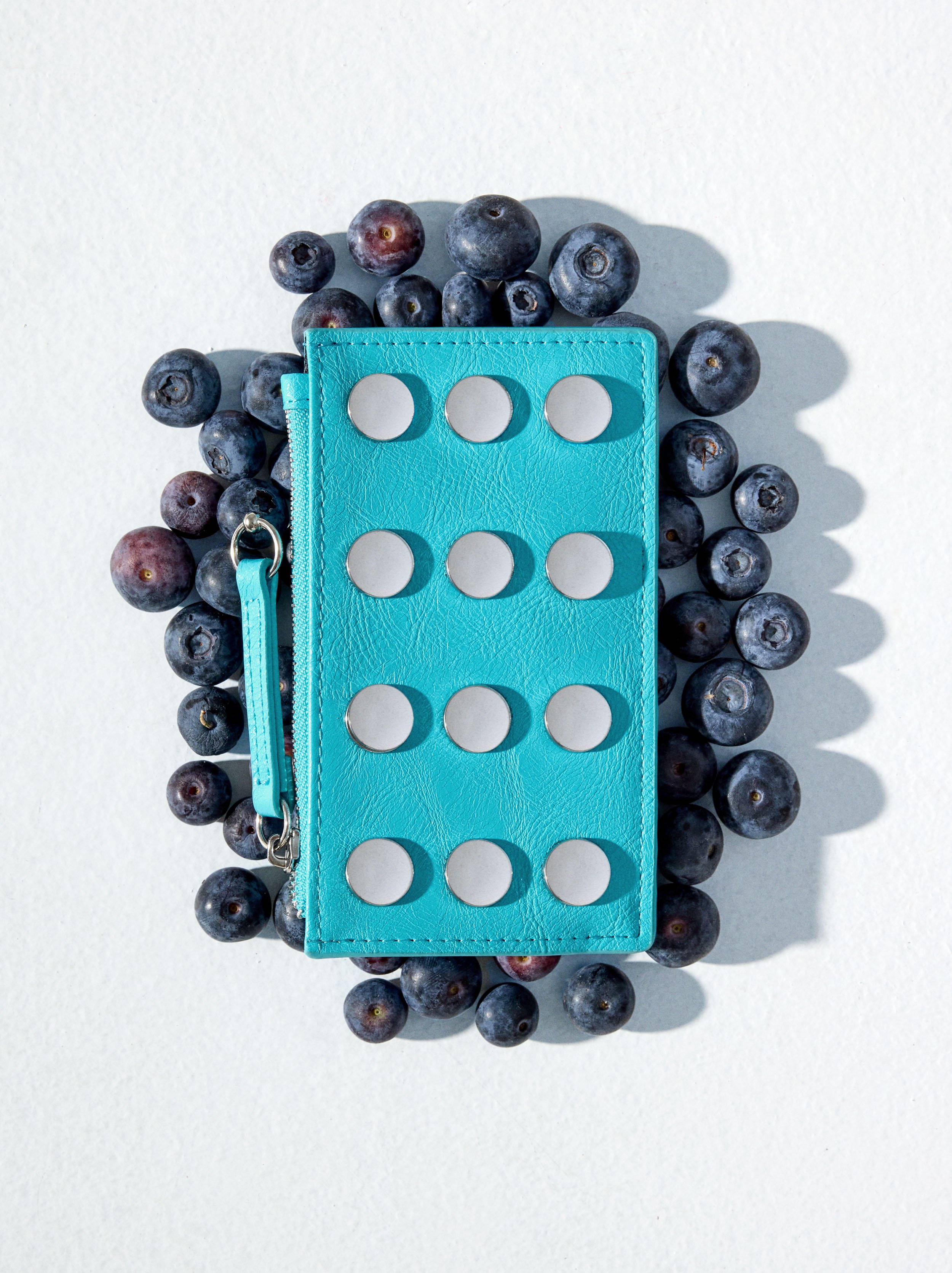 Card holder with studs