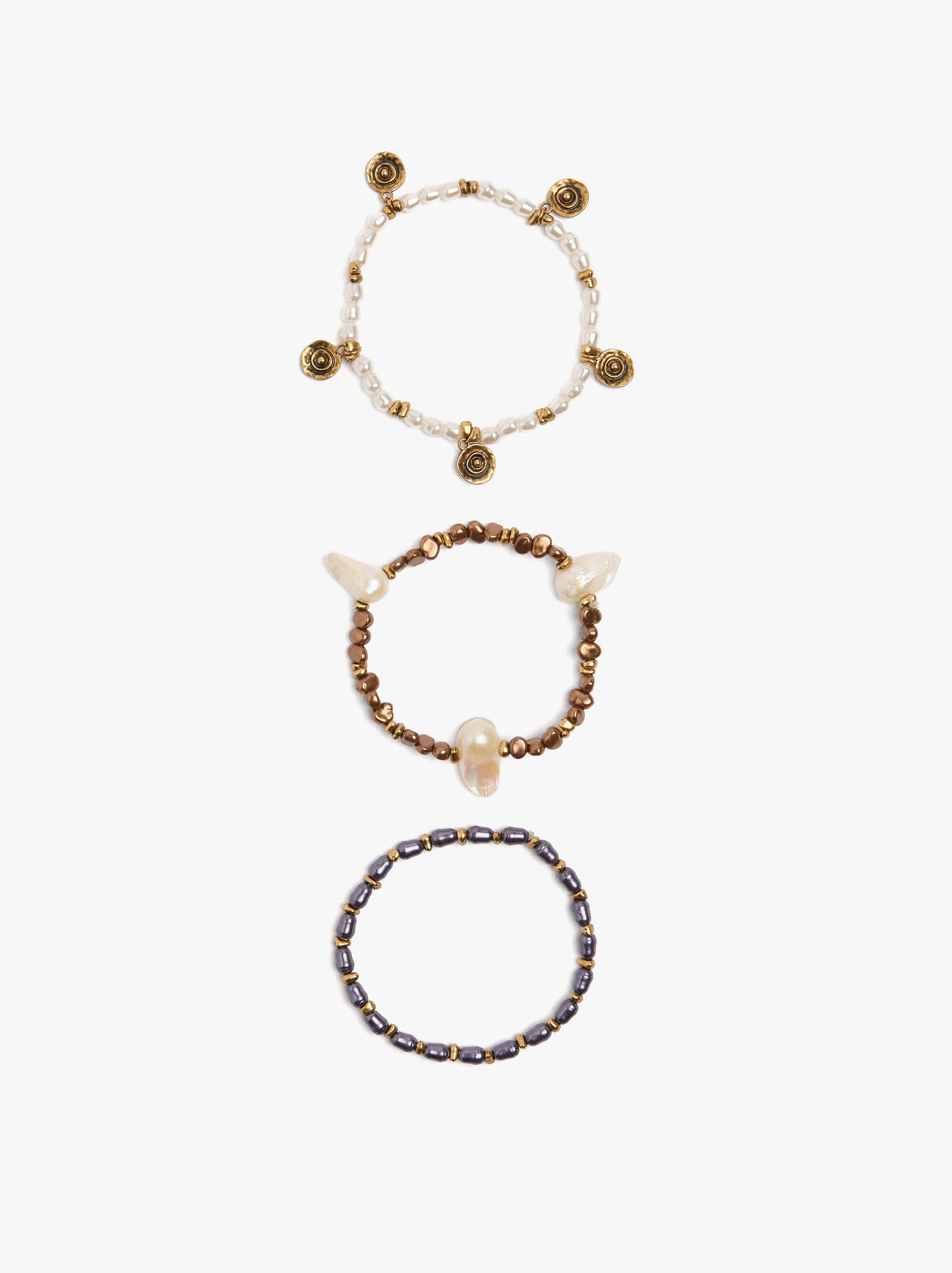 Set de pulseras el&aacute;sticas con perlas image number 2.0