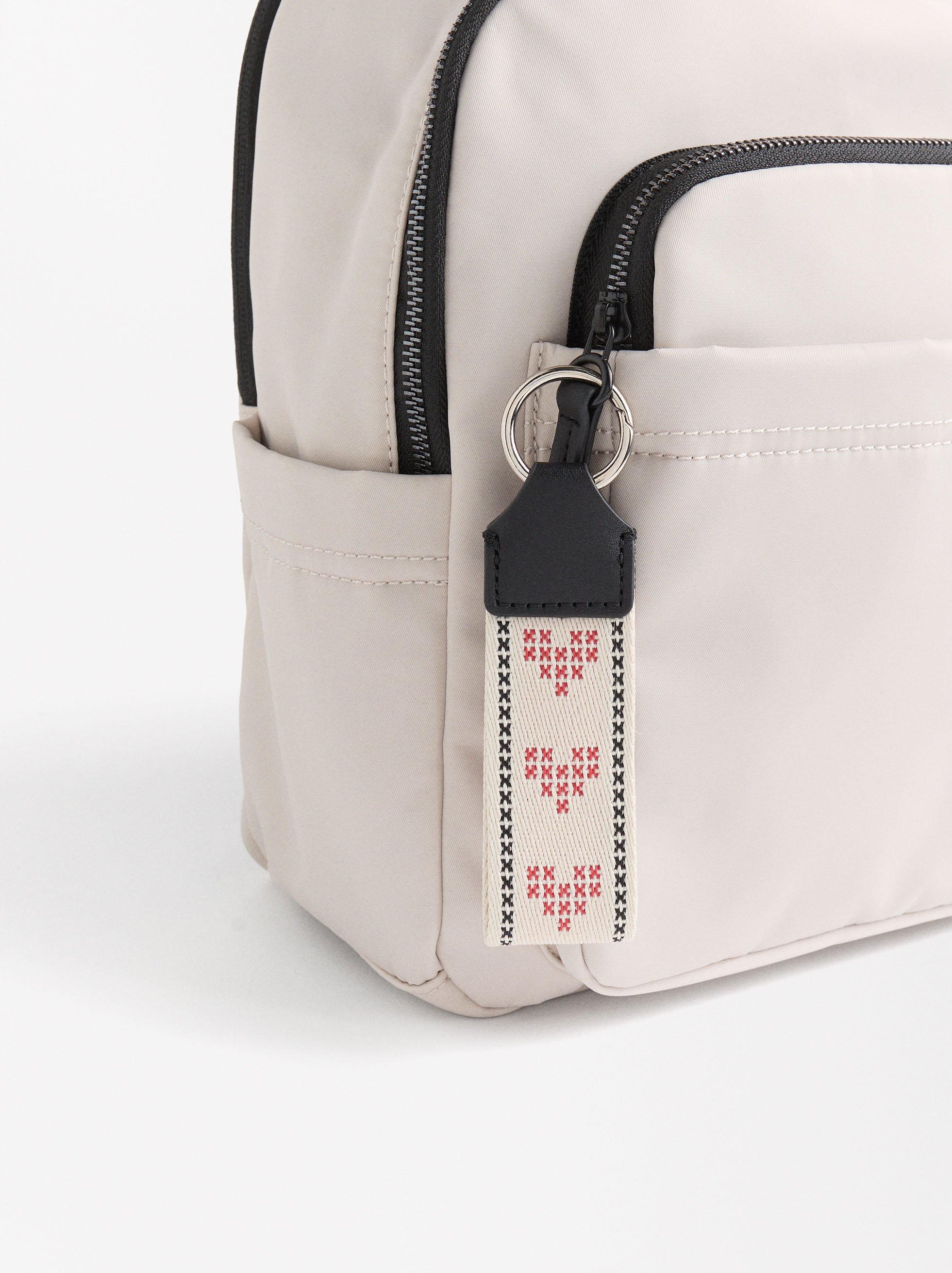 Nylon backpack with heart pendant image number 1.0