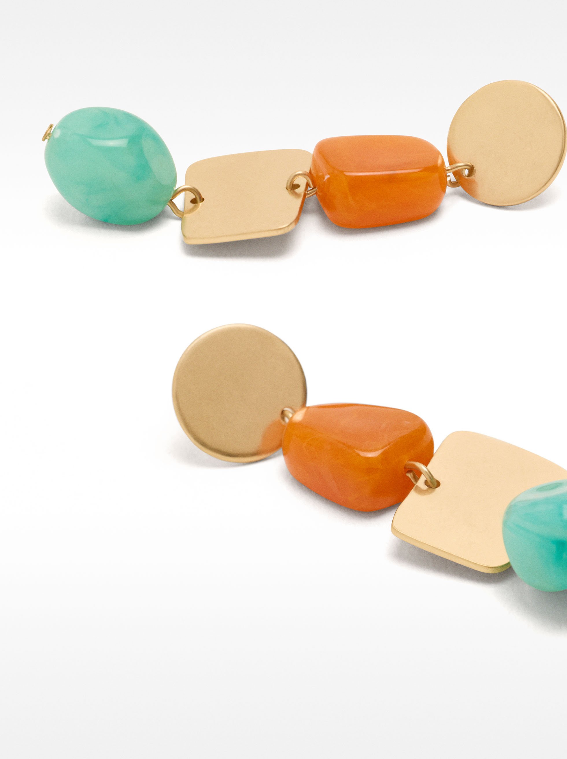 Geometric earrings with a stone effect image number 1.0