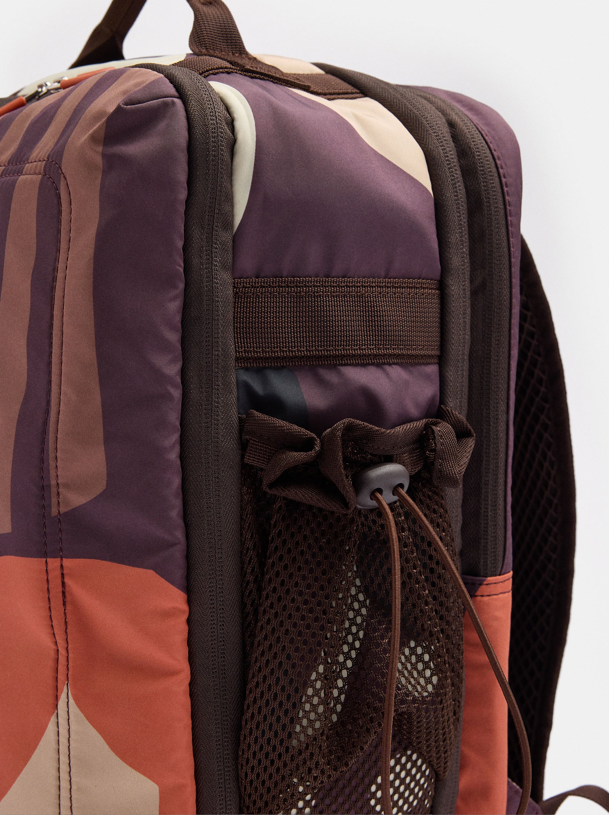 Printed nylon backpack with bottle holder image number 1.0