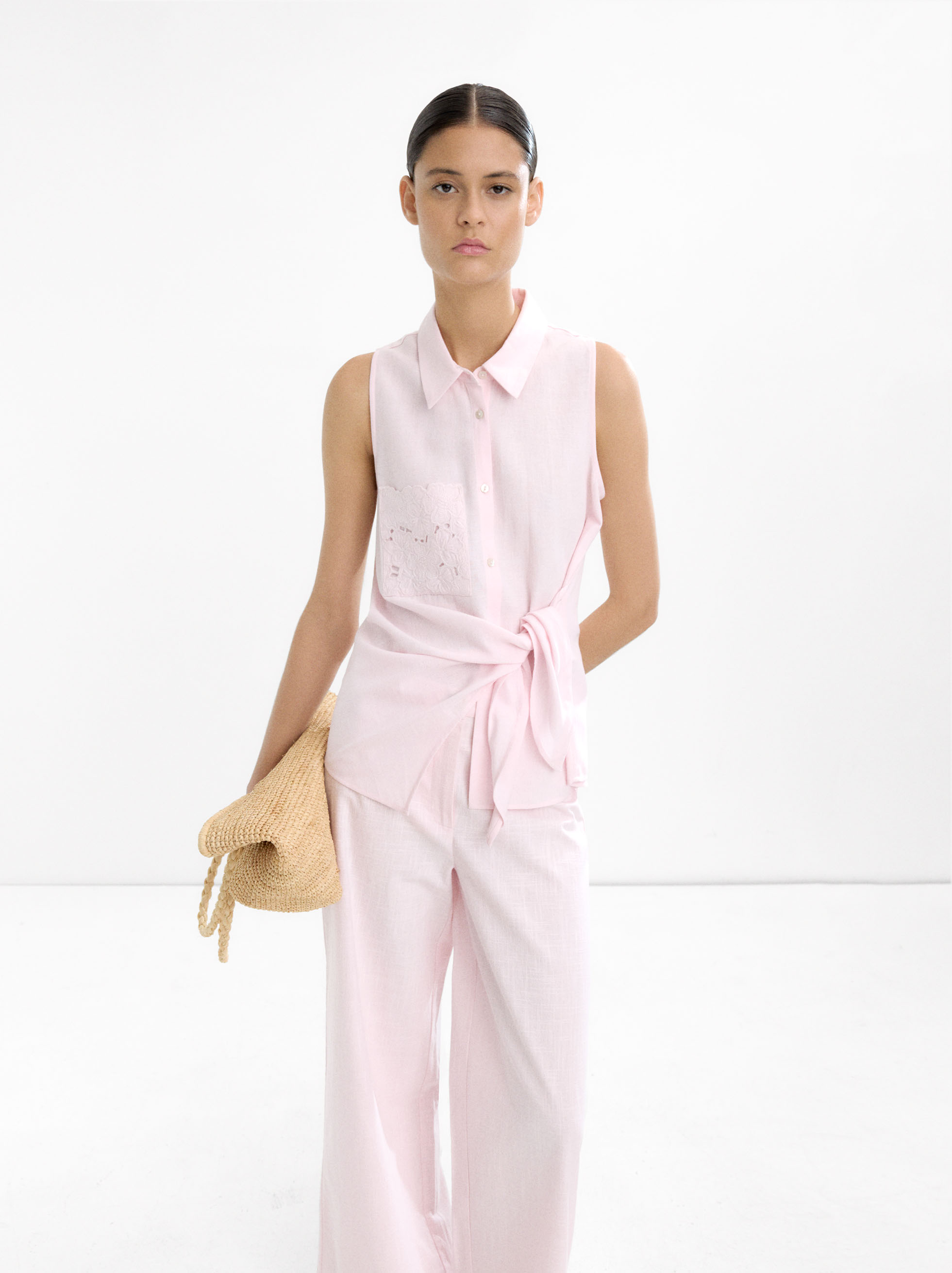 Top with embroidery and knot