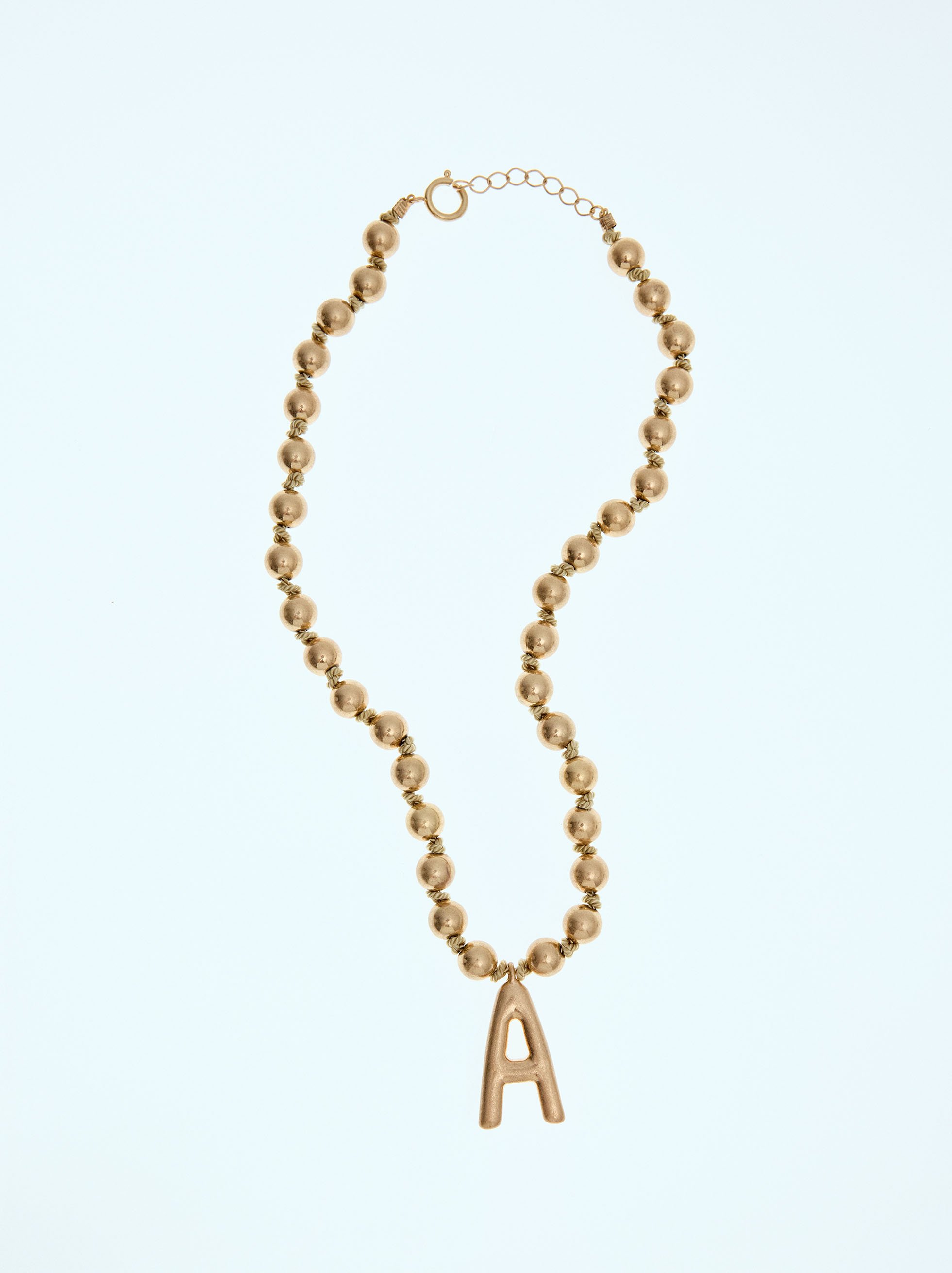 Short necklace with gold beads image number 0.0