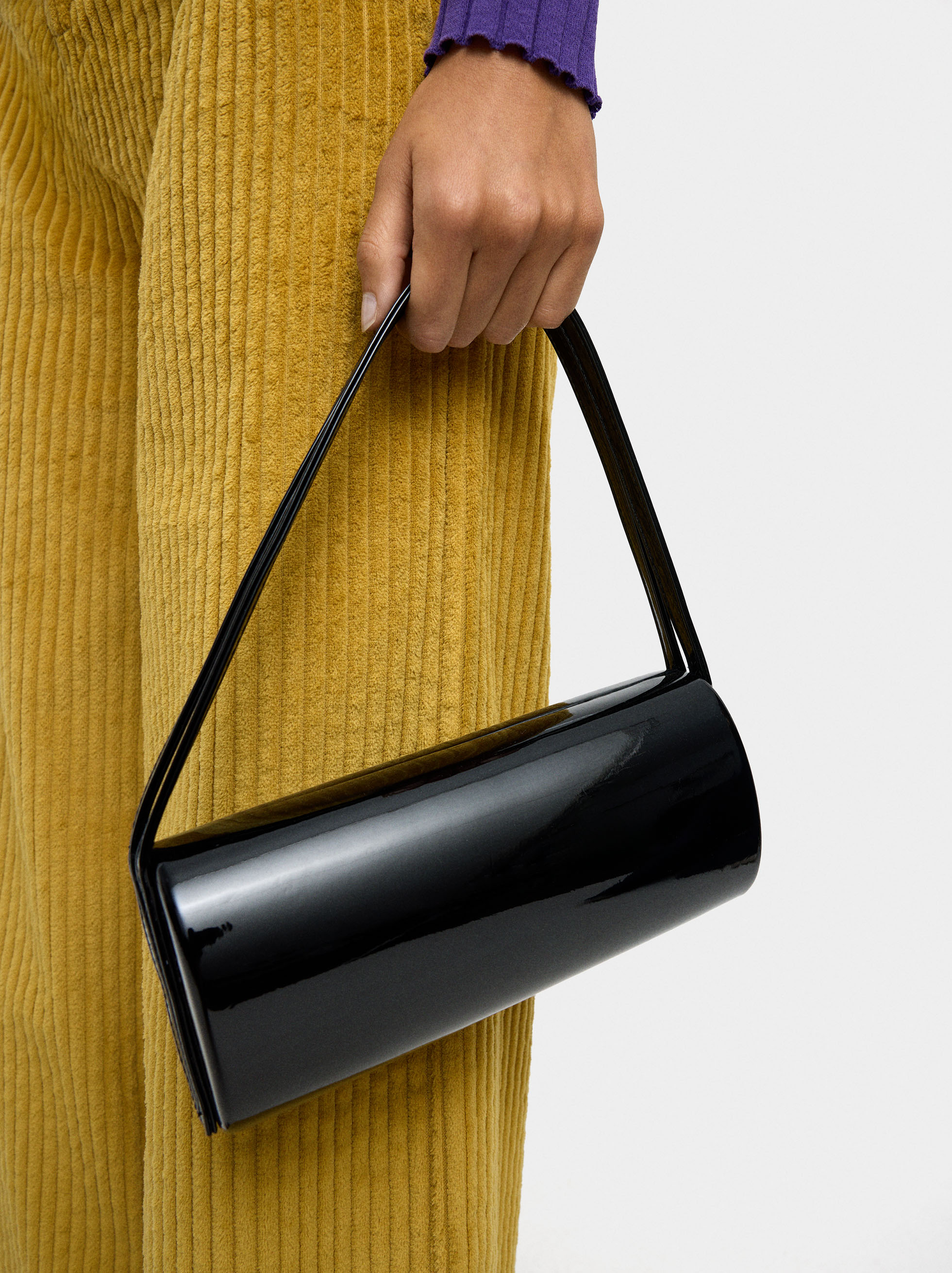 Cylindrical patent party clutch image number 1.0