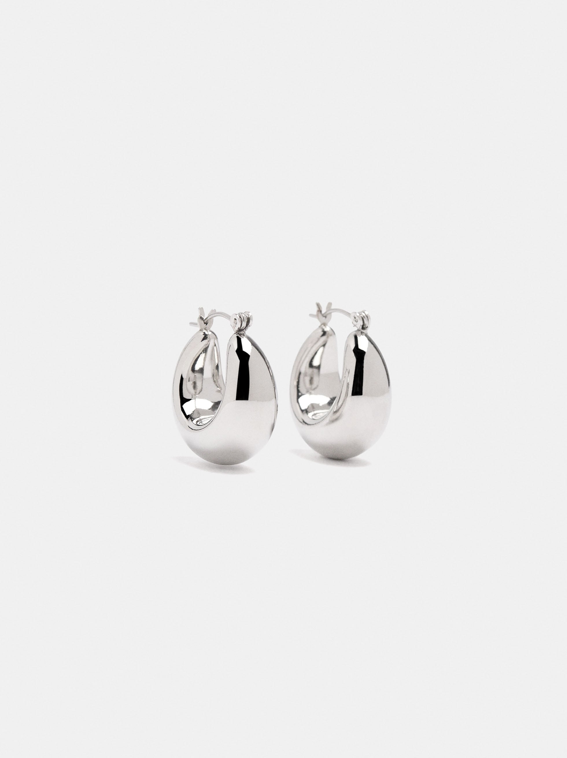 Elongated silver-toned hoop earrings image number 0.0