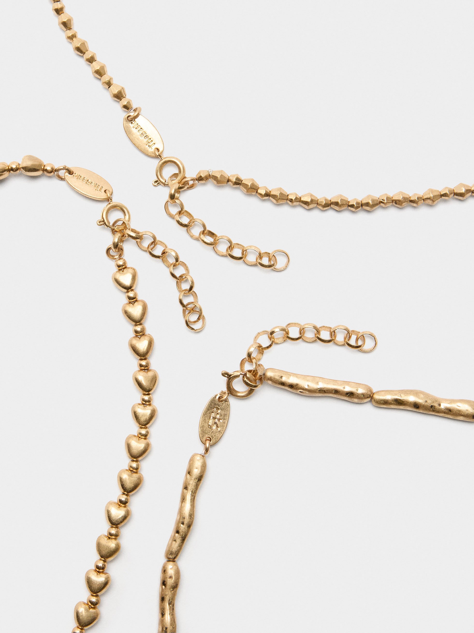 Set of short golden necklaces image number 3.0