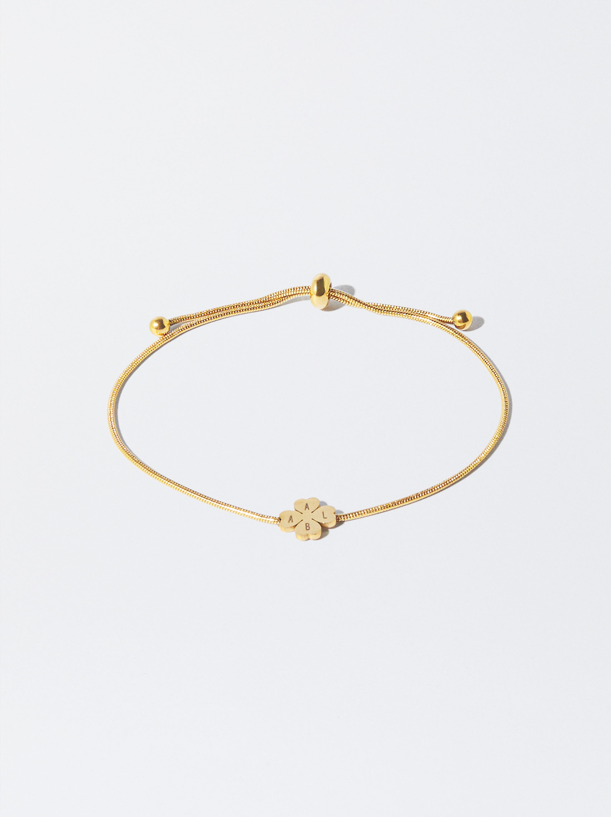 EXCLUSIVO ONLINE - Pulsera de acero inoxidable con trébol personalizable image number 0.0