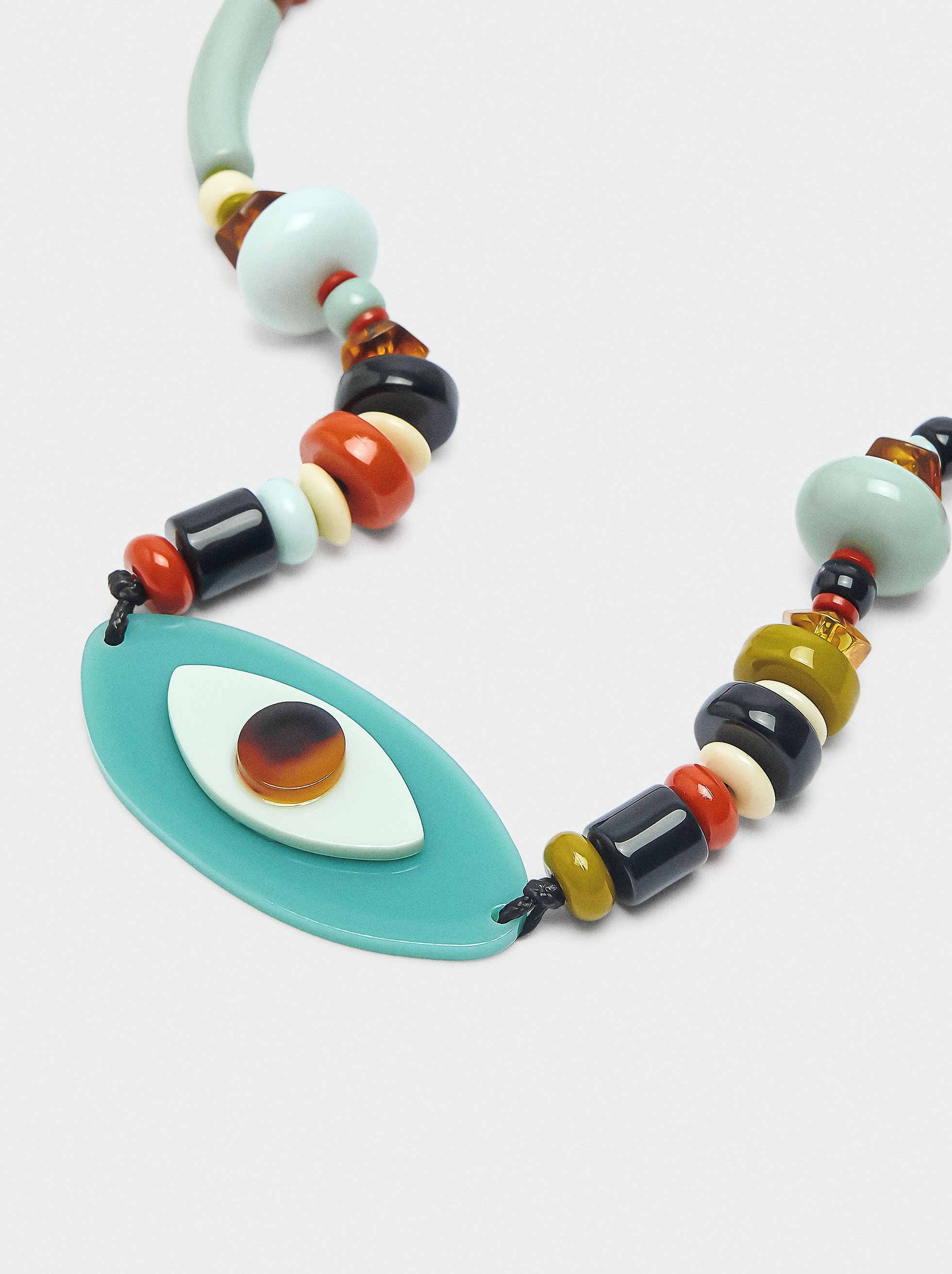 Collier court en perles multicolores et œil image number 1.0