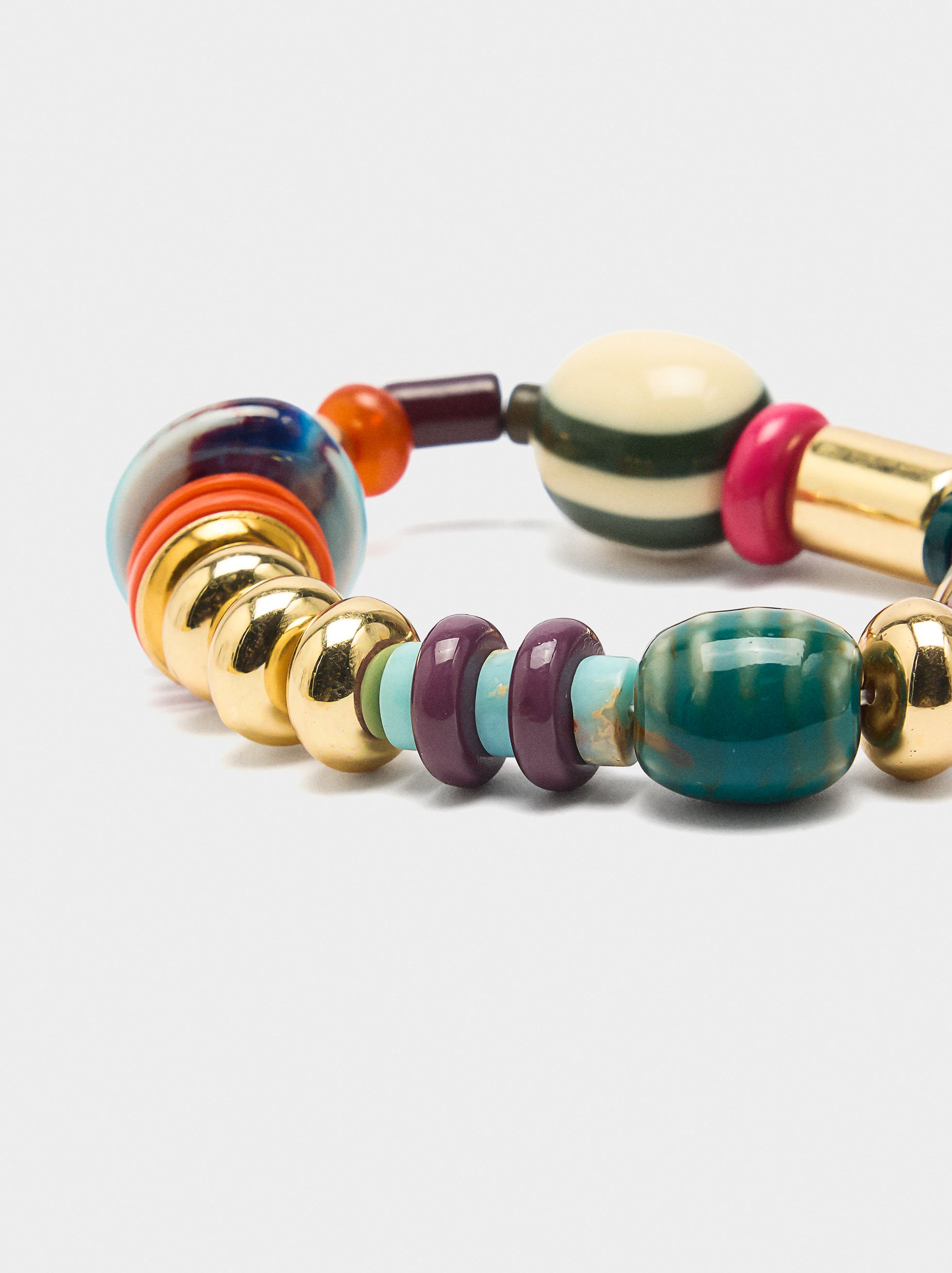 Elastisches Armband aus Stein- und Keramikperlen image number 1.0