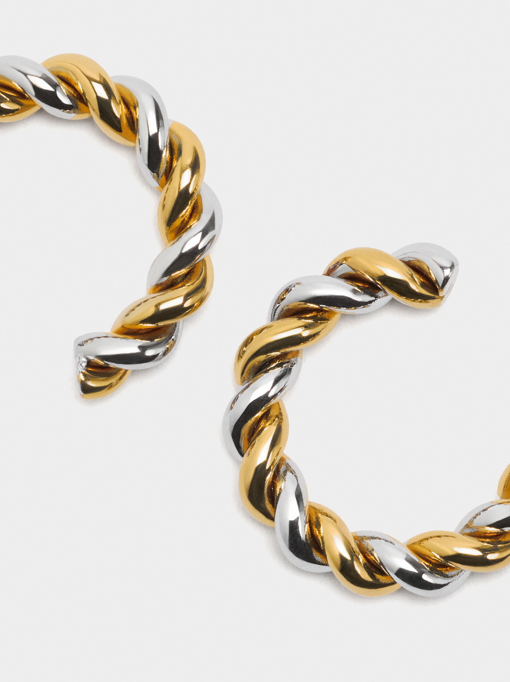 Intertwined hoop earrings – stainless steel image number 1.0