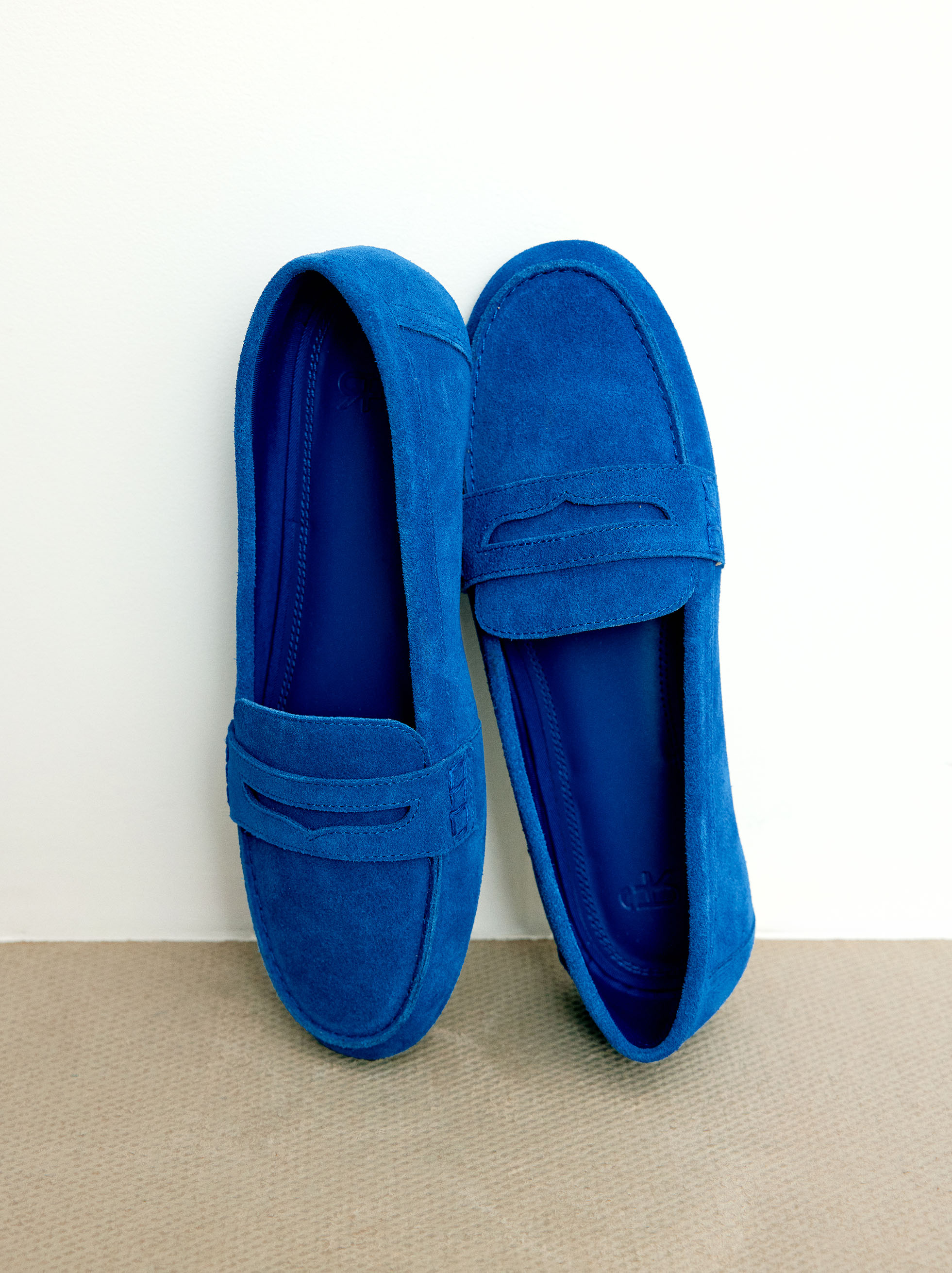 Leather moccasins with stitching