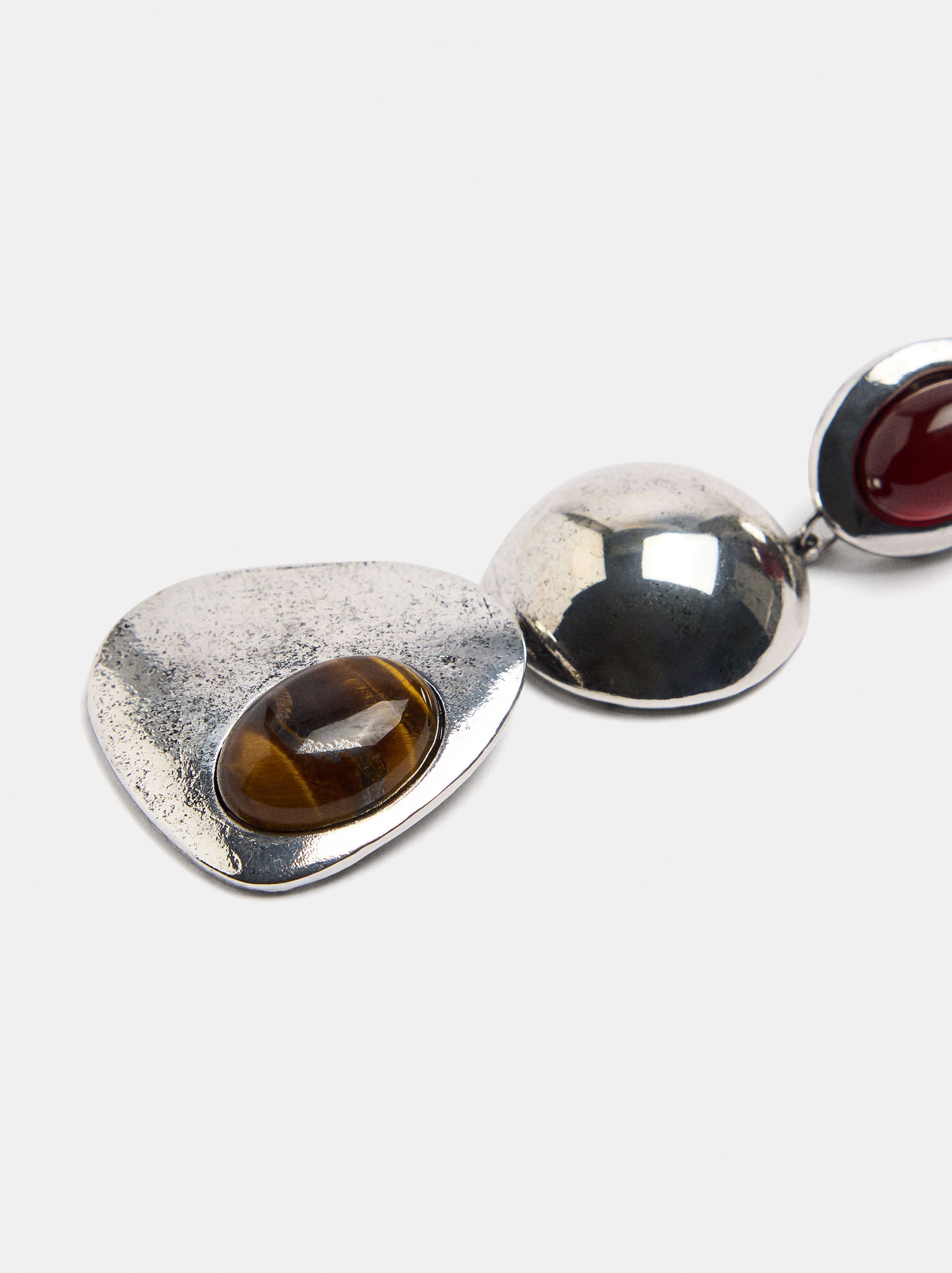 Boucles d'oreilles longues aux formes arrondies avec pierres image number 1.0