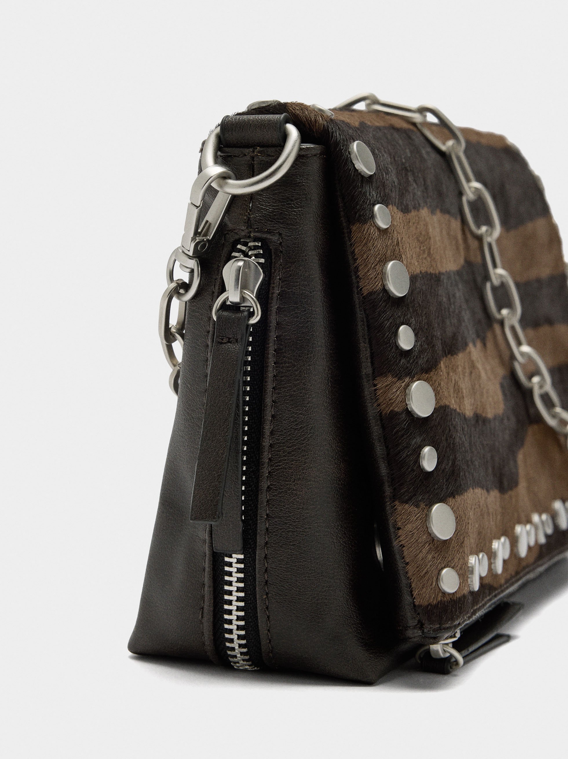 Shoulder bag with leather and studs details image number 1.0
