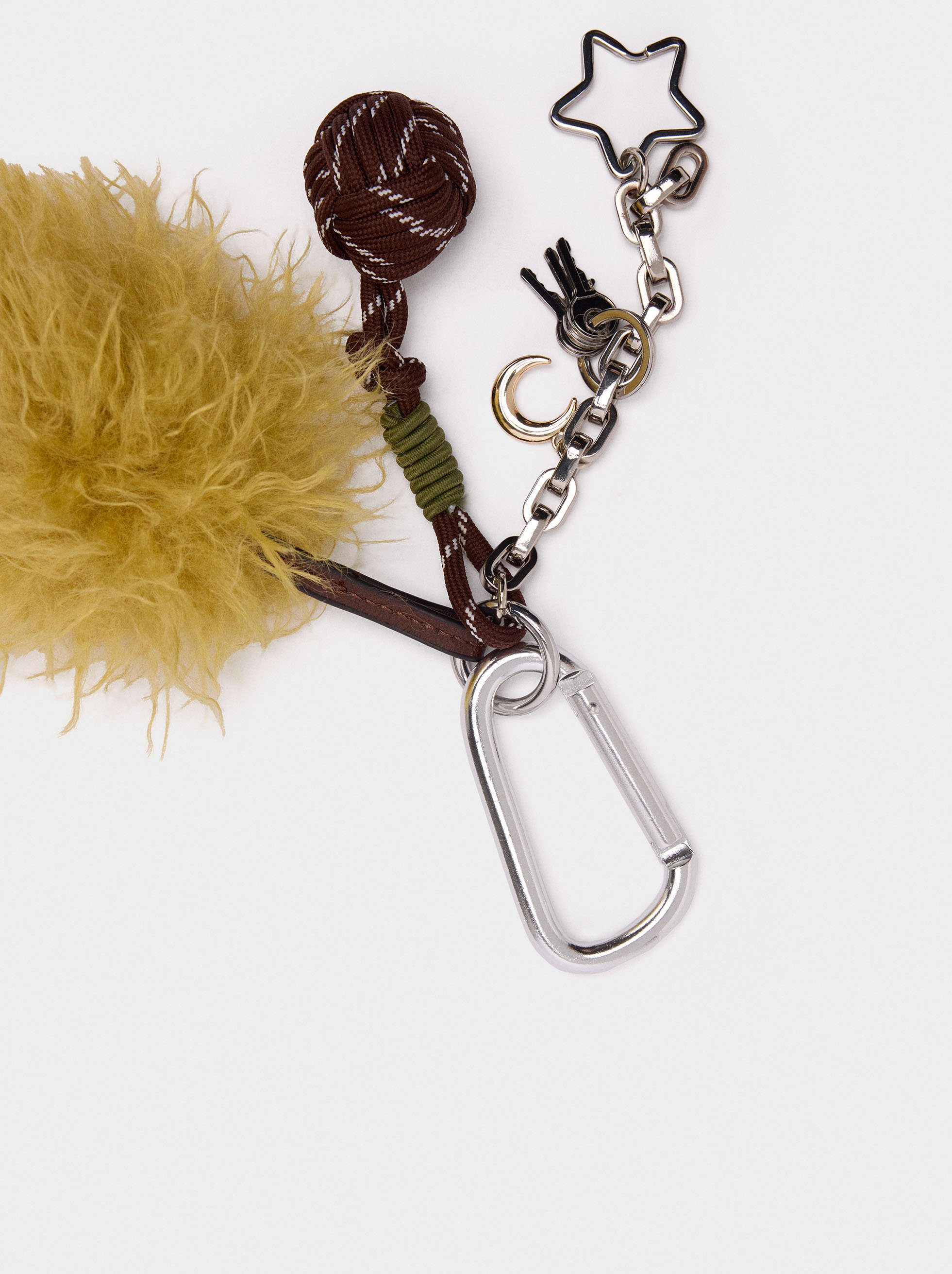 Keychain charm with pompom and star  image number 2.0