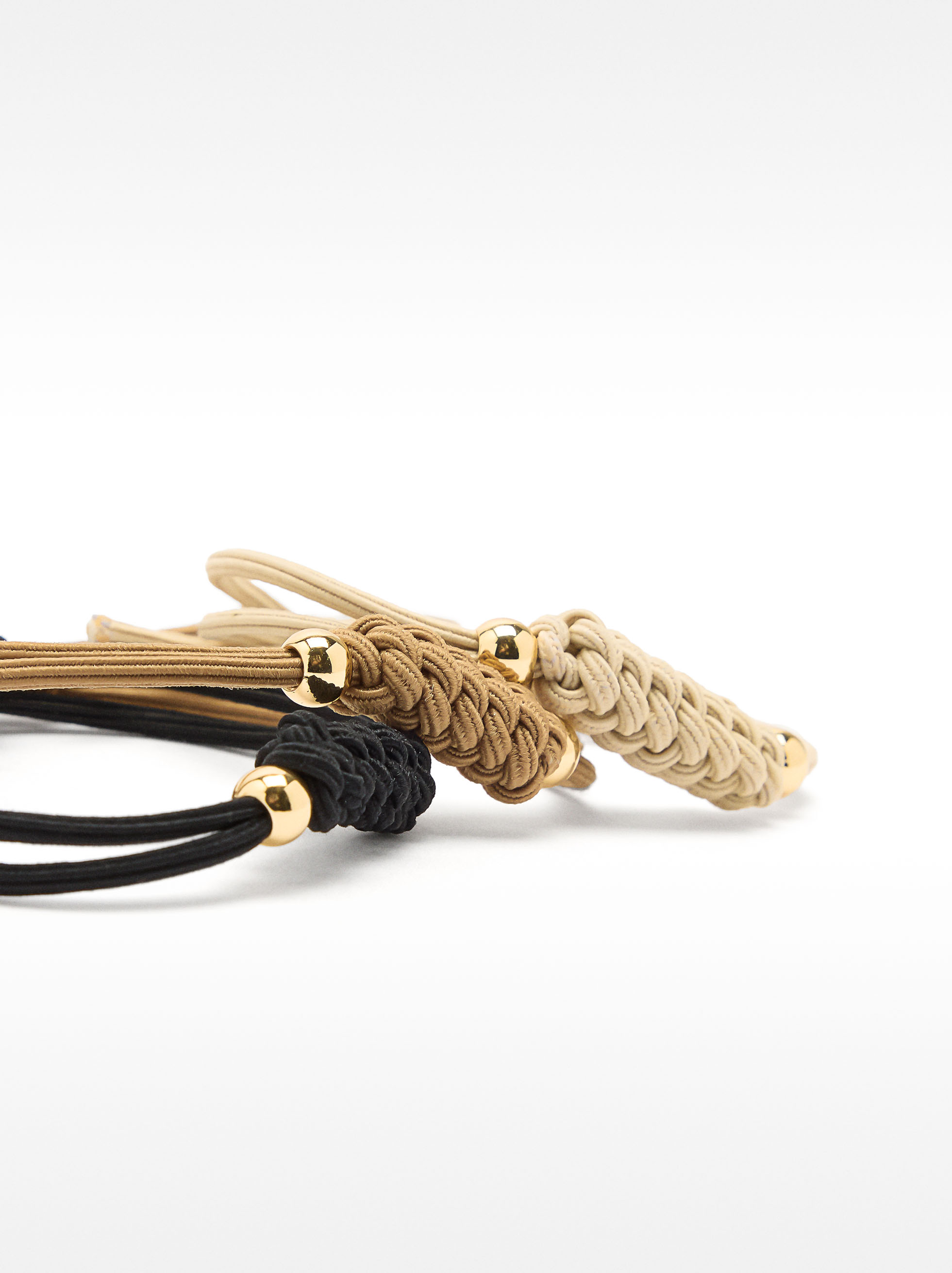 Set of intertwined elastics image number 1.0