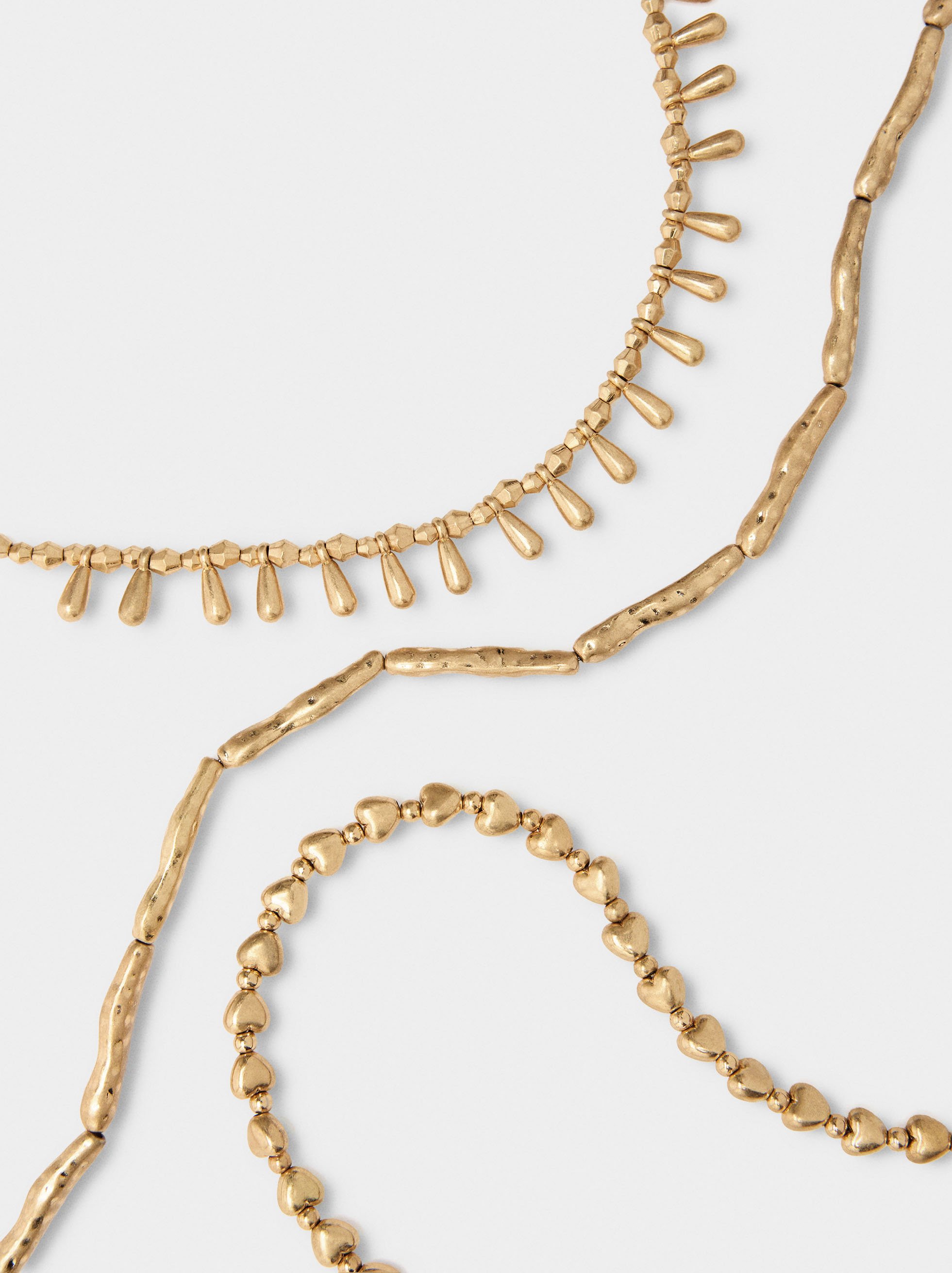 Set of short golden necklaces image number 2.0