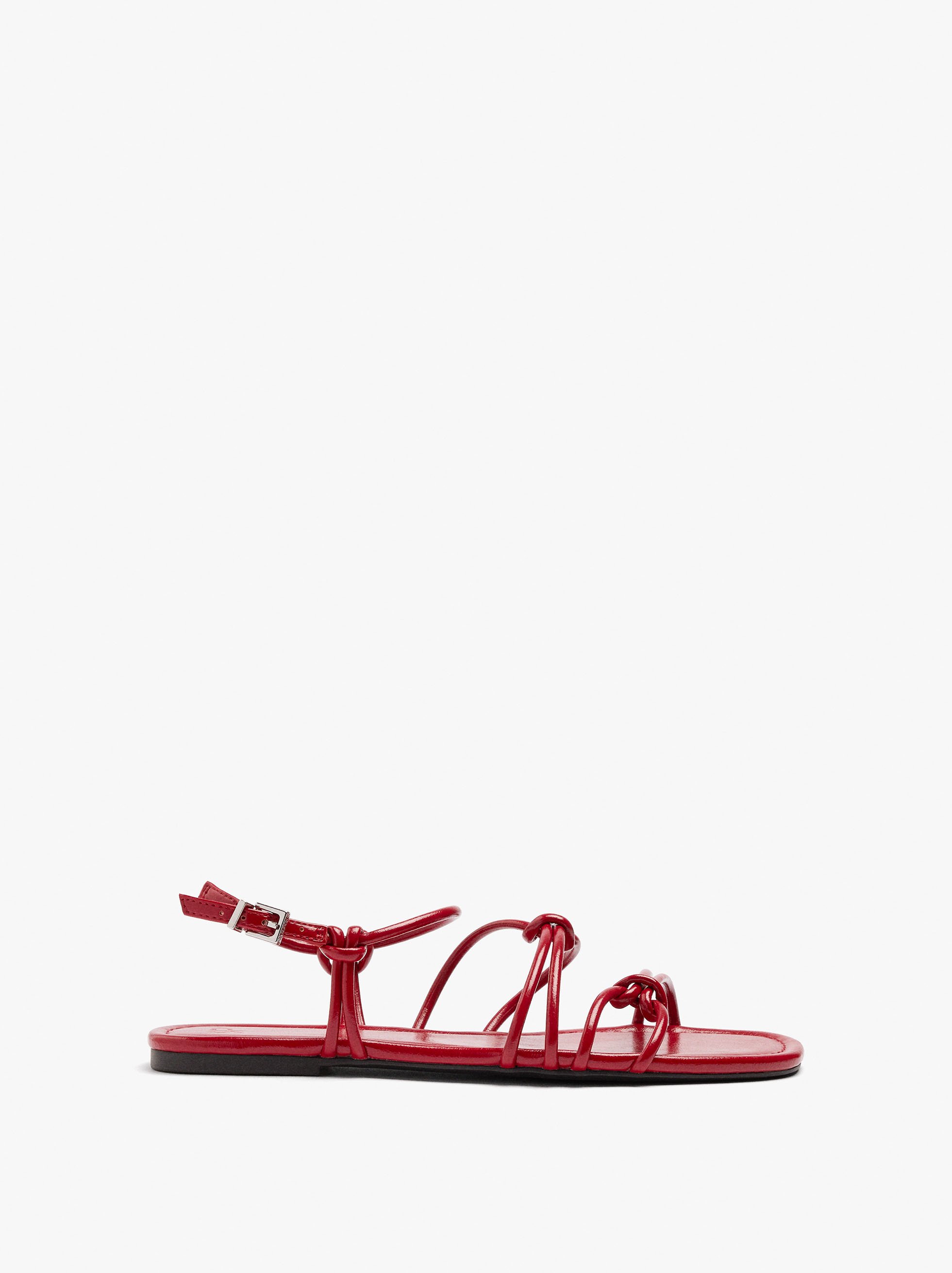 Flat sandals with straps and knots image number 1.0