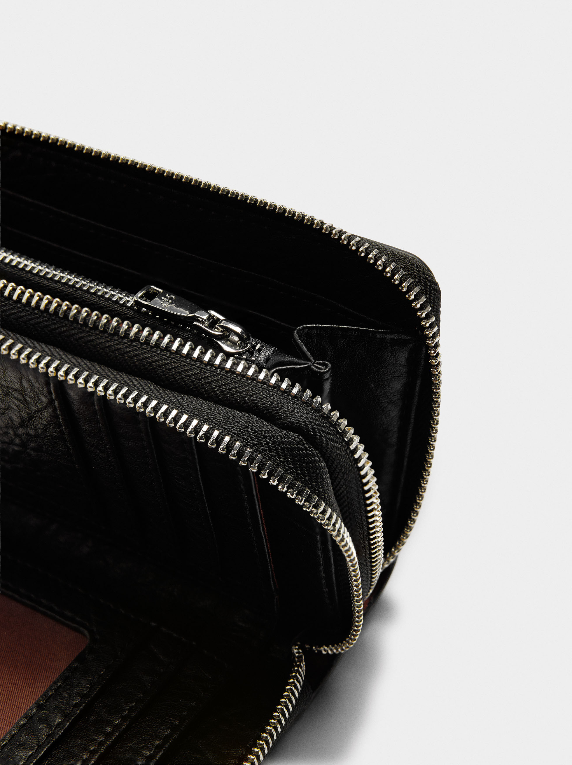 Wallet with texture and double zipper closure image number 2.0
