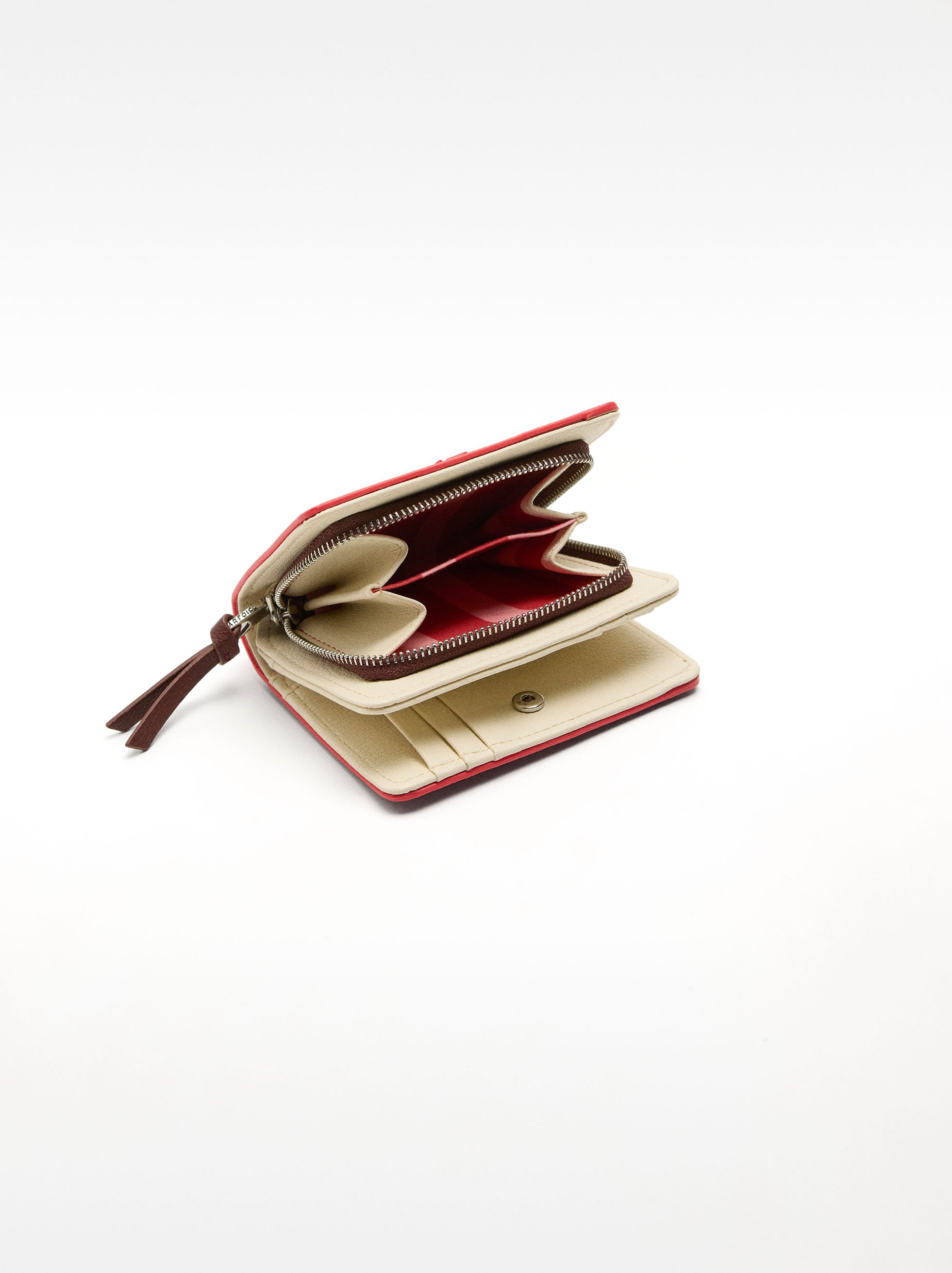 Wallet with textured contrasting colors image number 3.0