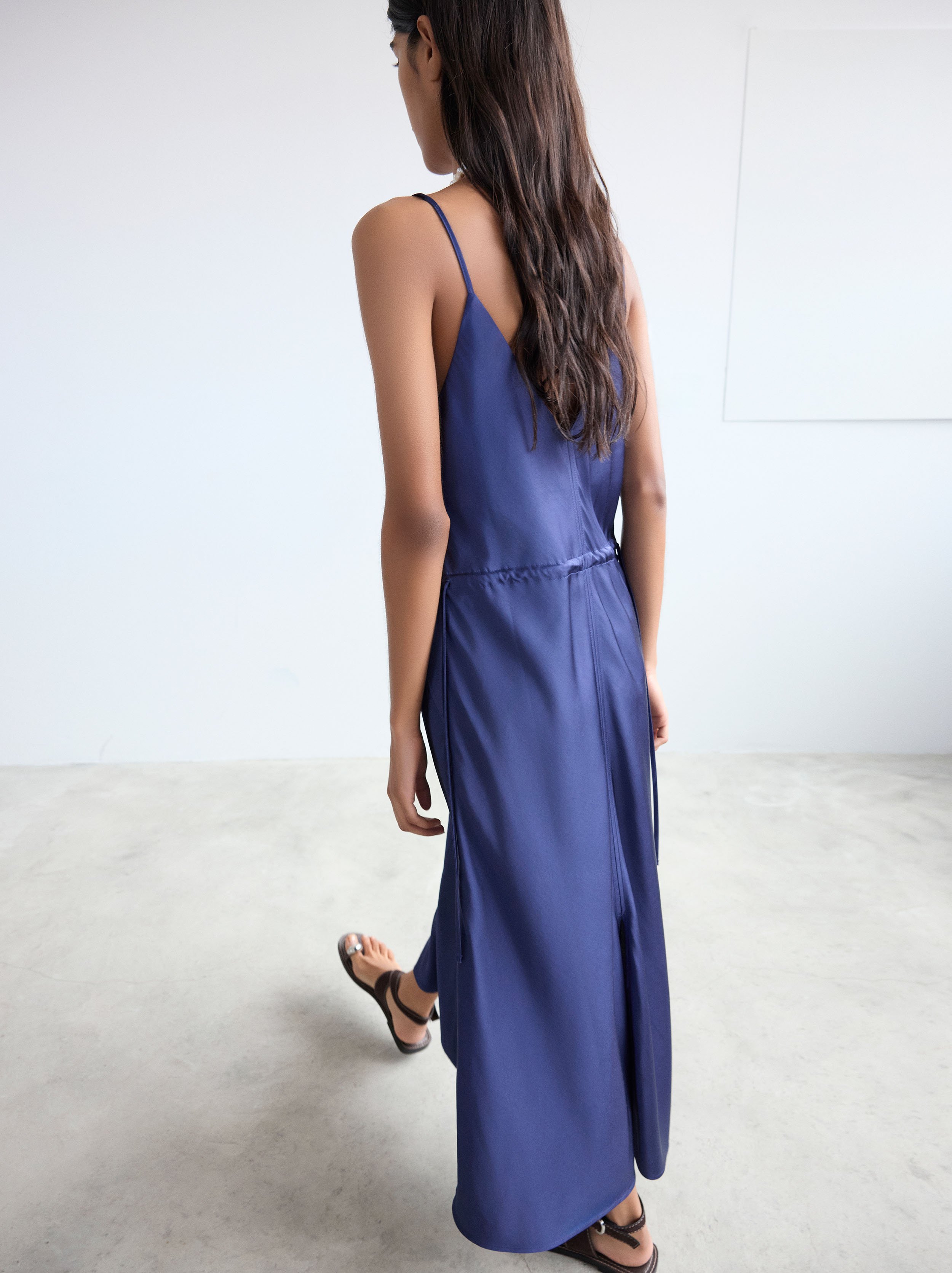 Dress with straps and seams